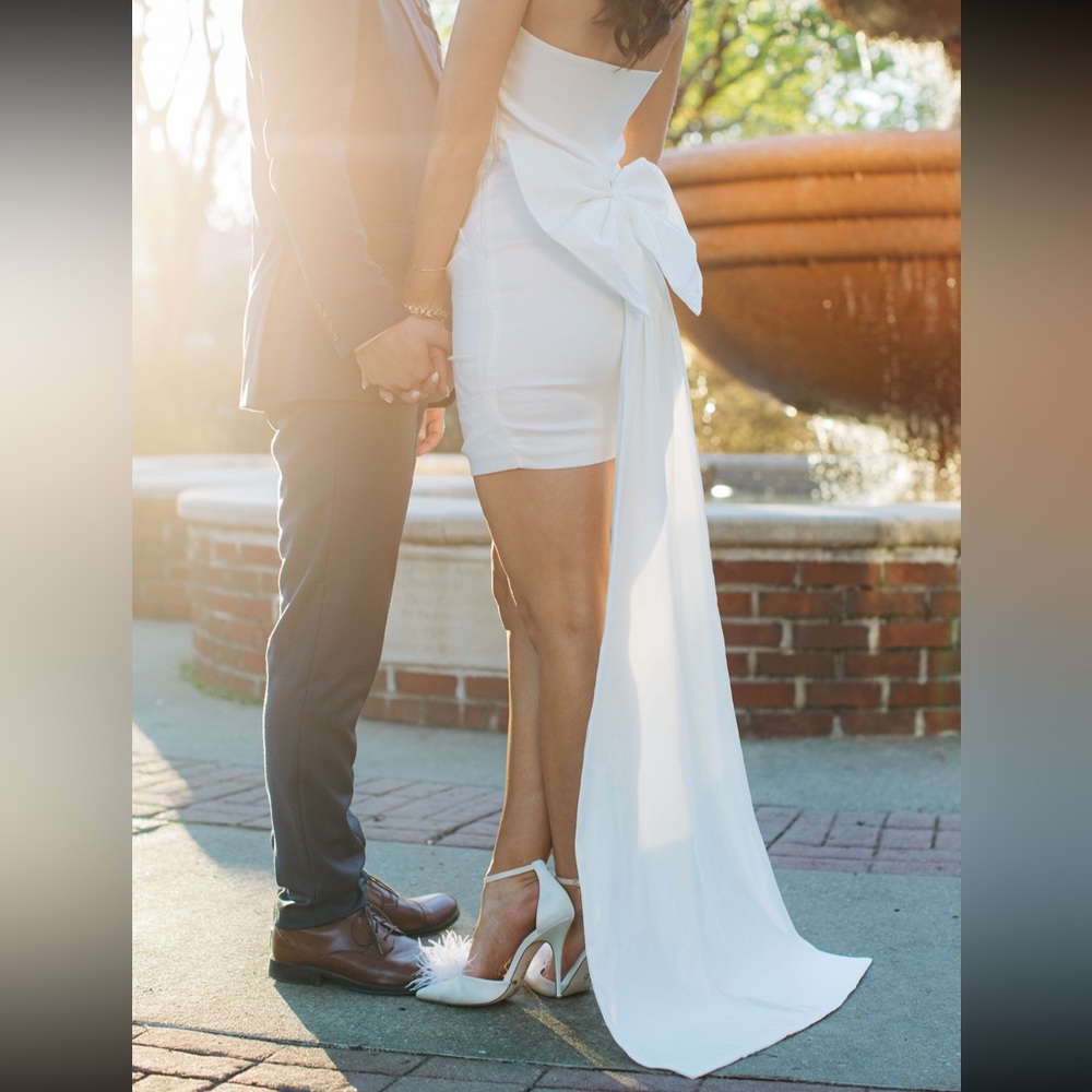 Elegant White Dress with Bow Detail